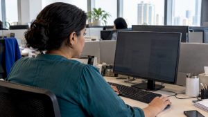 HR administrator reviewing an employee record