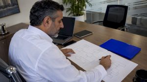 Architect mapping a low-code layer over legacy ERP